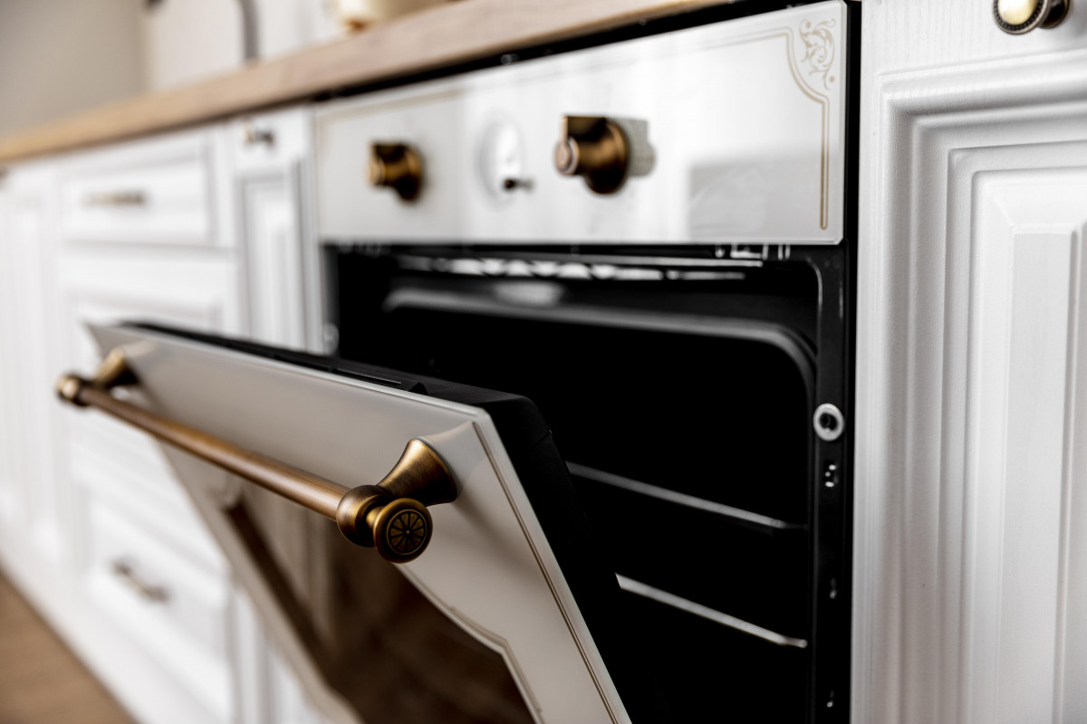 Close up oven with golden details