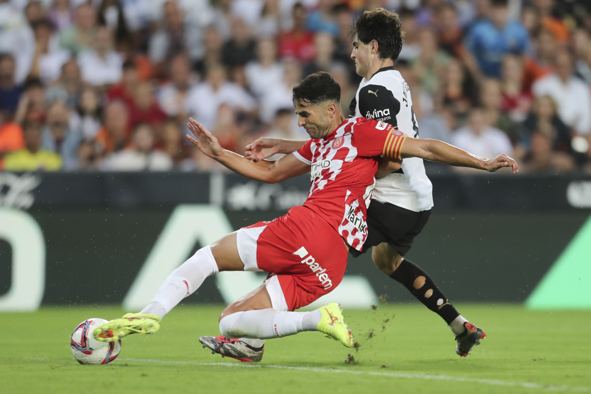 EuropaPress 6226712 juan pedro ramirez of girona and javi guerra of valencia cf in action