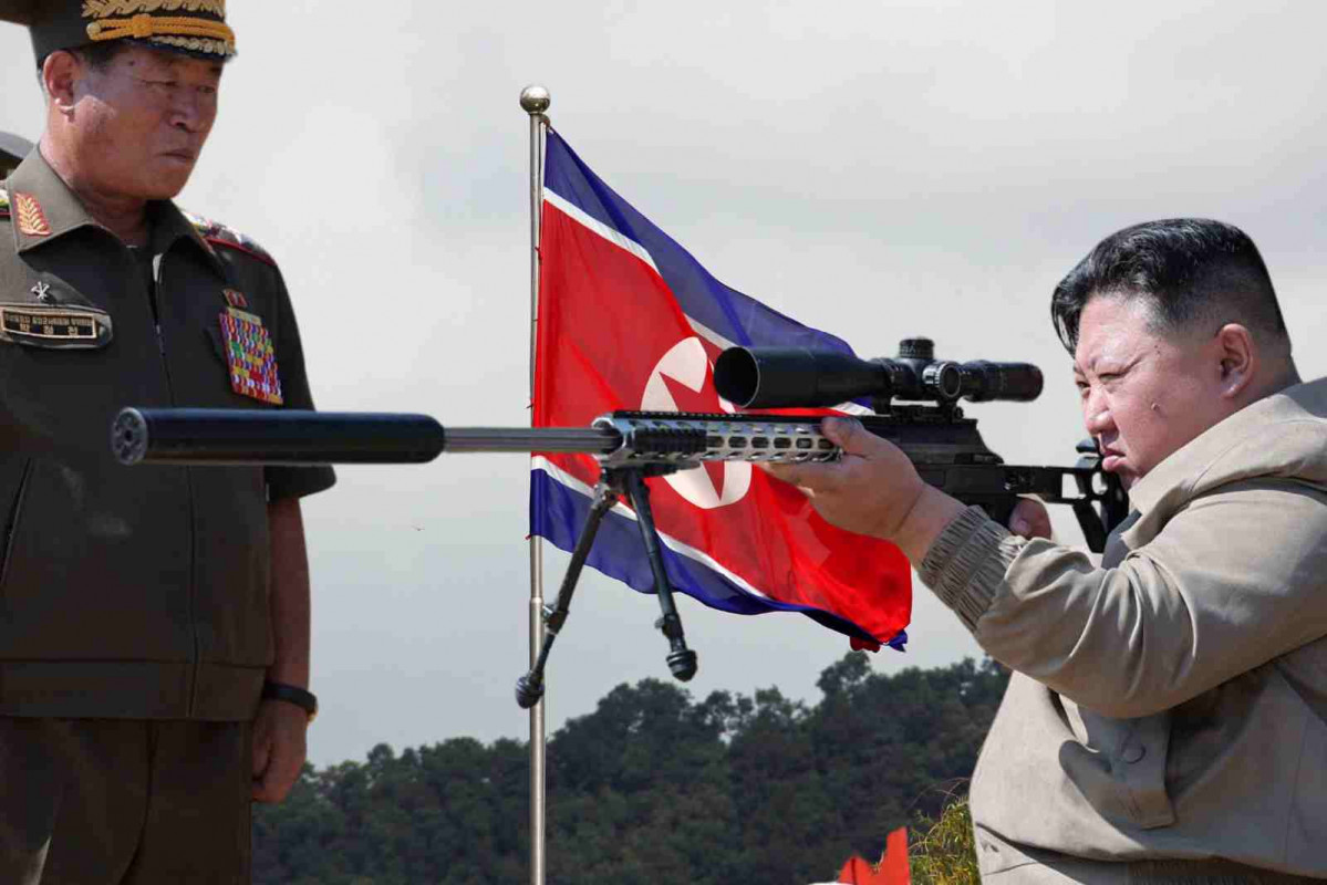 Kim Jong Un con un arma