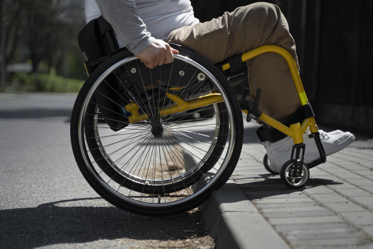 Side view disabled man wheelchair