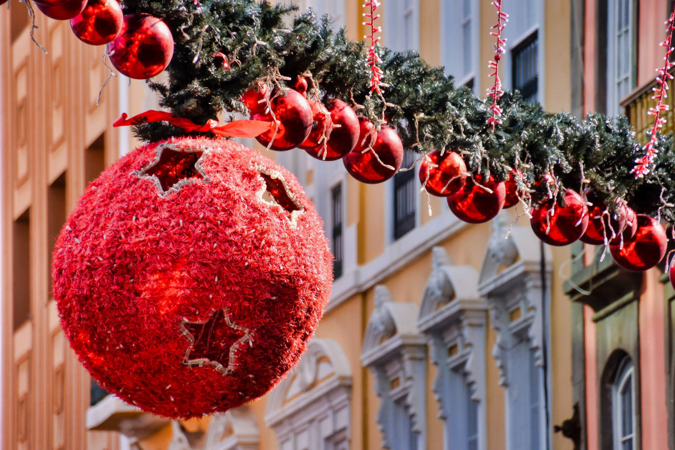 Large circular christmas toy hanging around others line