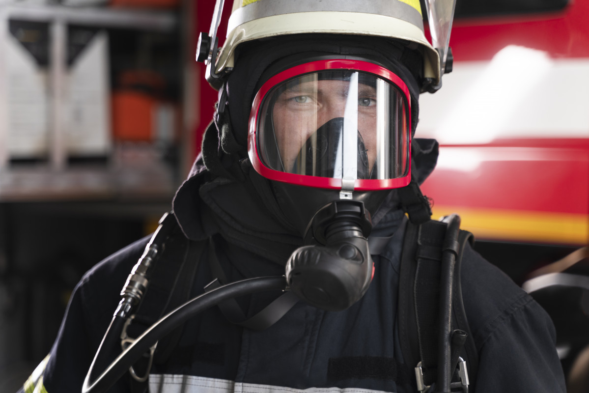 Firefighter station equipped with protective suit fire mask