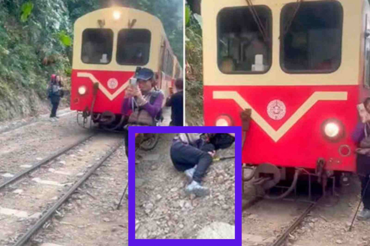 Mujer tomándose el selfie en las vias del tren